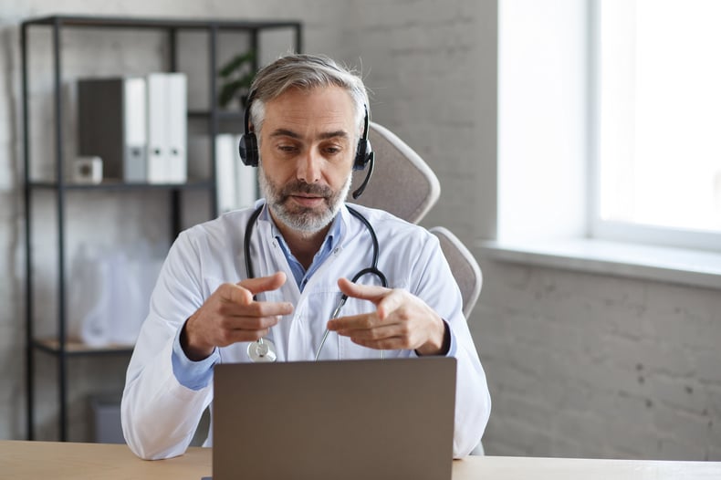 Doctor talking to patient via a telehealth call.